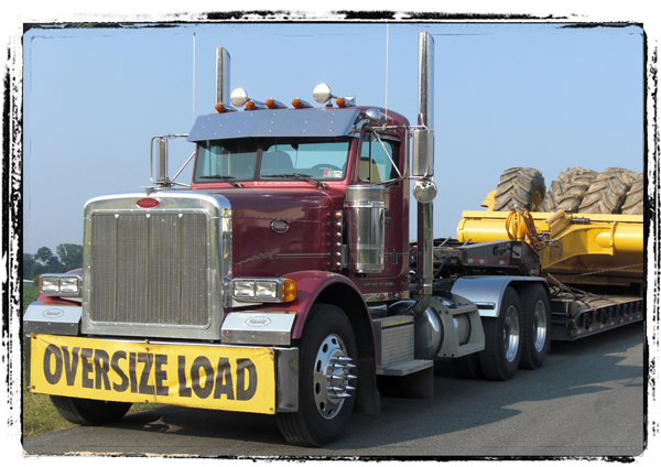 Image: Rig hauling heavy equipment to final destination.